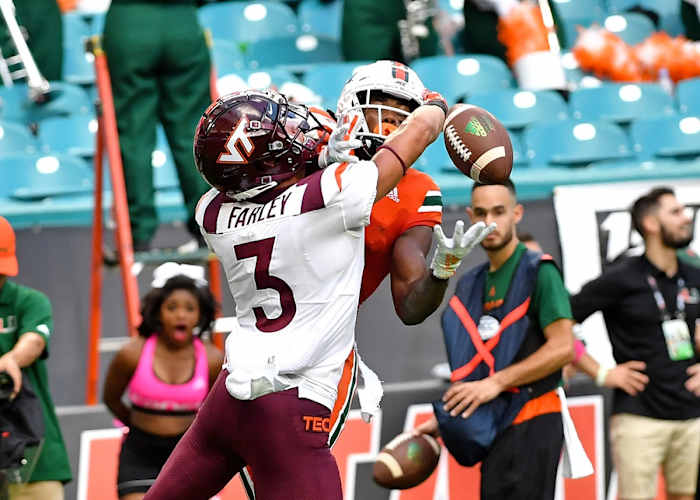 Oct 5, 2019; Miami Gardens, FL, USA; Miami Hurricanes wide receiver K.J. Osborn (2) is unable to make a catch as Virginia Tech Hokies defensive back Caleb Farley (3) defends the play during the second half at Hard Rock Stadium. Mandatory Credit: Steve Mitchell-USA TODAY Sports